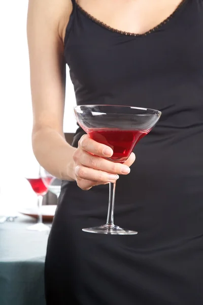 Kvinna hand med red cocktail Stockfoto