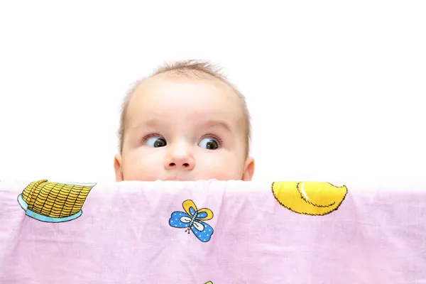 Toddler in a baby bed — Stock Photo, Image