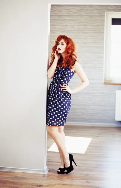 Fashion portrait of red haired girl. Stock Image
