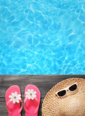 Holiday concept, flip flops a the pool clipart