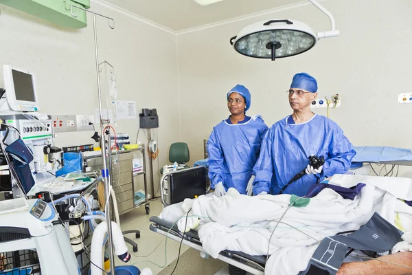 stock image Surgery room with surgeon and nurses