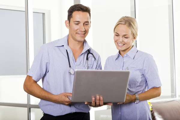 Young doctor and nurse — Stock Photo, Image