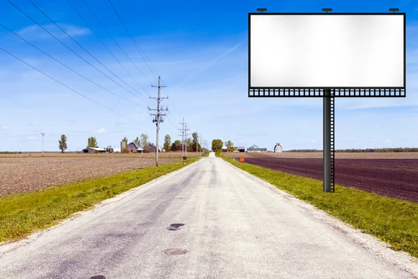 Billboard na estrada do país — Fotografia de Stock