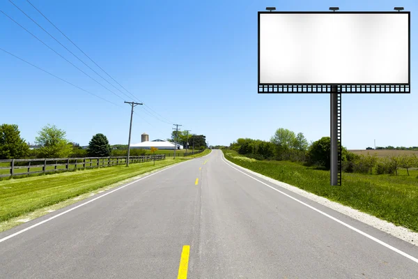 Billboard na venkovské silnici — Stock fotografie