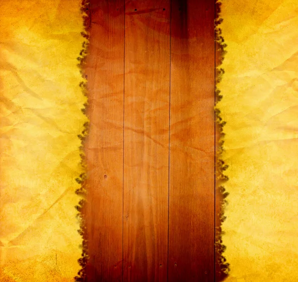 Papel viejo sobre tabla vieja de madera — Foto de Stock