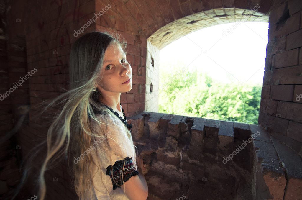 Tennage girl inside ruins