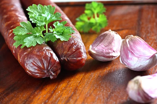 stock image Smoked sausage and garlic