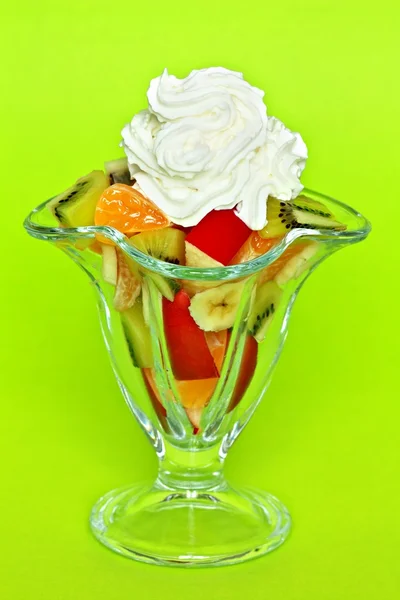 Fruit salad with whipped cream — Stock Photo, Image