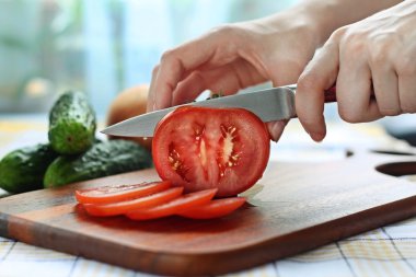 Slicing tomato clipart