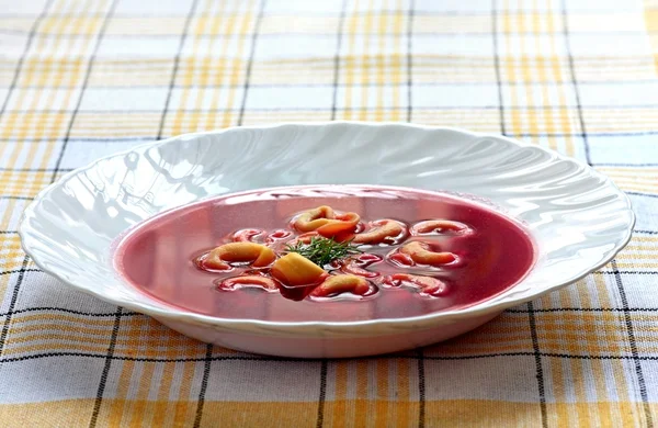 stock image Soup with tortellini