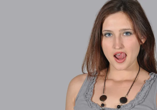 Stock image Beautiful girl with tongue