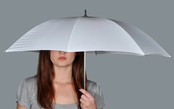 A girl under the umbrella — Stock Photo, Image