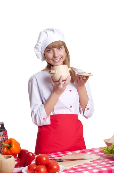 Attraktiva cook kvinna en över vit bakgrund — Stockfoto