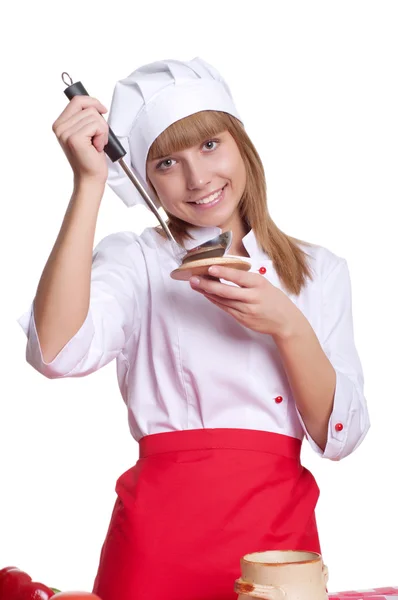 Atraktivní kuchaře žena přes bílé pozadí — Stock fotografie
