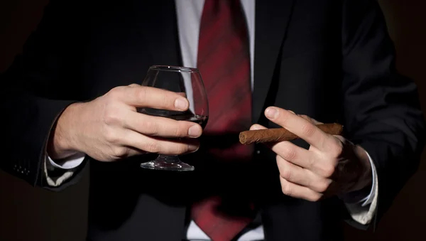 stock image Rich person, holds a cigar and whisky