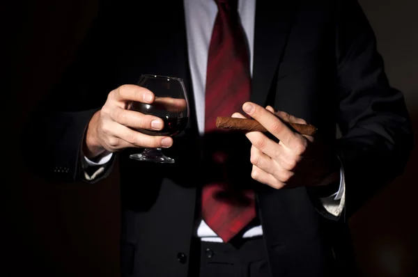 stock image Rich person, holds a cigar and whisky