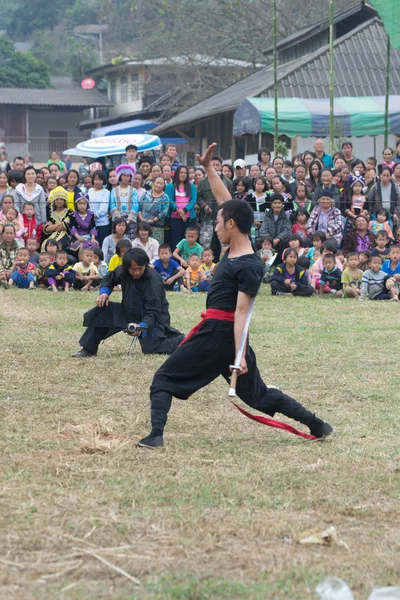 stock image CHIANG RAI, THAILAND -DECEMBER 28: Tradition new year party and martial art shows of mong hill tribe ,Wiang pa pao where tourist daily visiting, December 28 2011 in Chiang rai, Thailand.