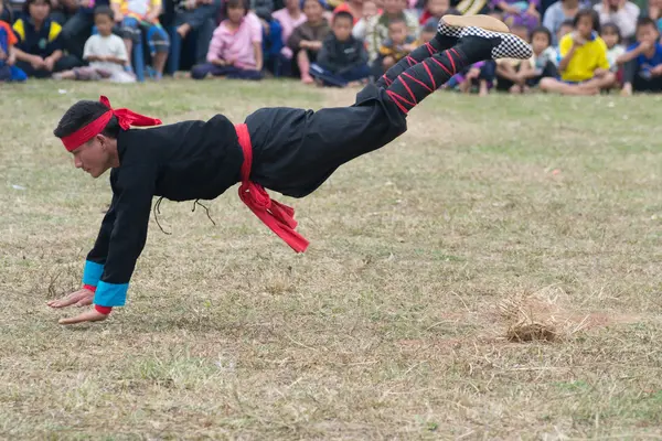 stock image CHIANG RAI, THAILAND -DECEMBER 28: Tradition new year party and martial art shows of mong hill tribe ,Wiang pa pao where tourist daily visiting, December 28 2011 in Chiang rai, Thailand.