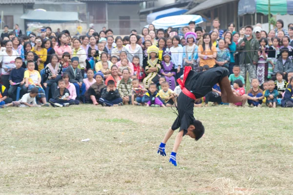 CHIANG RAI, THAILAND -DECEMBER 28: Tradition new year party and martial art shows of mong hill tribe ,Wiang pa pao where tourist daily visiting, December 28 2011 in Chiang rai, Thailand. — Stock Photo, Image