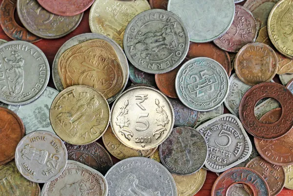 Nya, gamla och vintage indiska mynt bakgrund — Stockfoto
