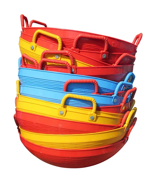 Nové barevné plastové košíky izolovaných na bílém — Stock fotografie
