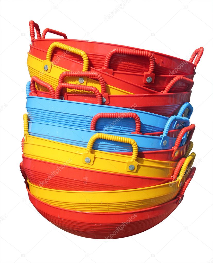 New colorful plastic baskets isolated on white