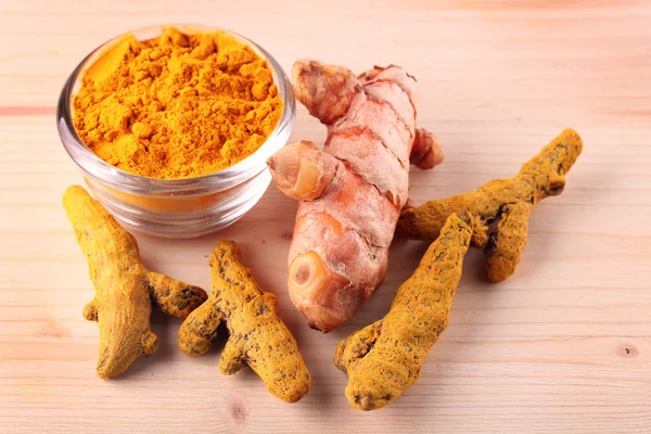 Fresh, dried and powdered turmeric root — Stock Photo, Image
