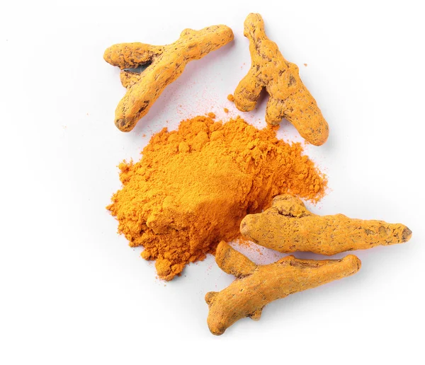 Turmeric root in dried and powdered form — Stock Photo, Image