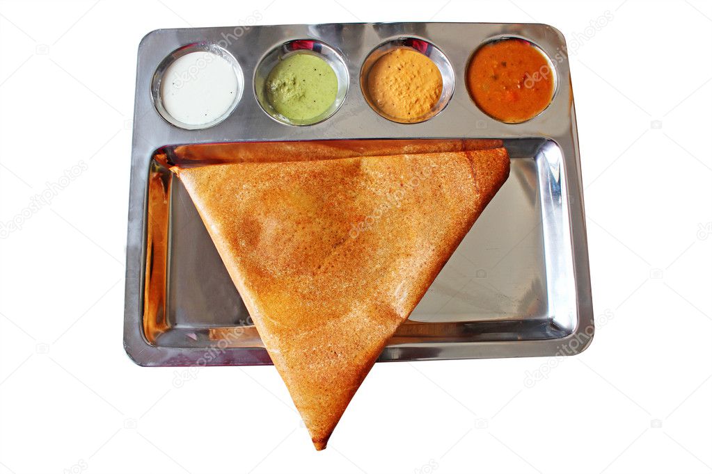 Appetizing and delicious traingular Indian masala dosa in golden