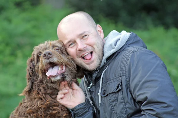 Homem e seu cão Fotografias De Stock Royalty-Free