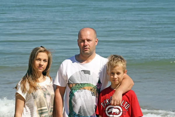 해변에 있는 가족 스톡 사진
