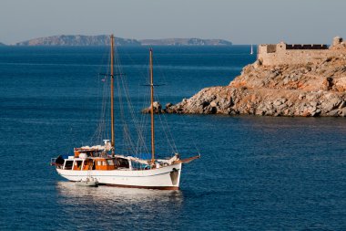 Yacht near Hydros island, Greece clipart