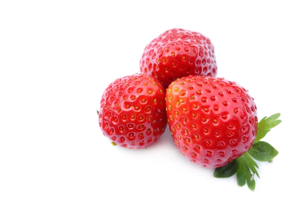 Three fresh strawberries on white — Stock Photo, Image
