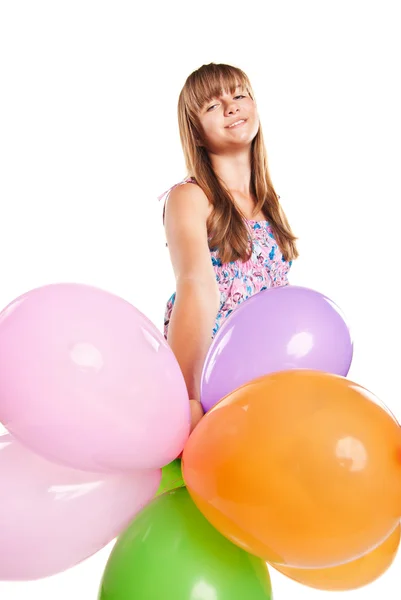 Teenage girl playing with balloons — Stock Photo, Image