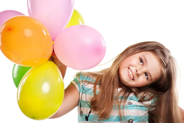 Holčička s balónky na bílém pozadí — Stock fotografie