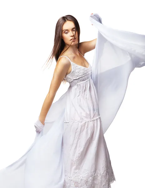 Młoda kobieta taniec w przepiękny sukienka biały — Zdjęcie stockowe