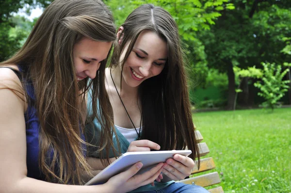 Girls with tablet computer — Stock Photo, Image