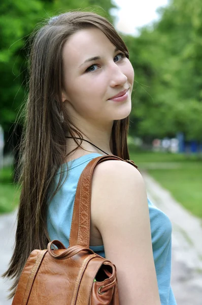 Girl with book bag — Stock Photo, Image