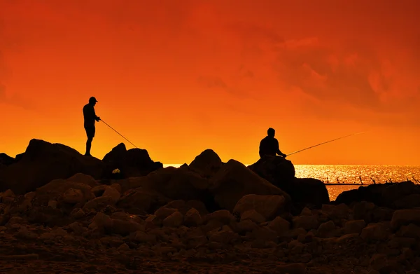 Gün batımında balıkçılık — Stok fotoğraf