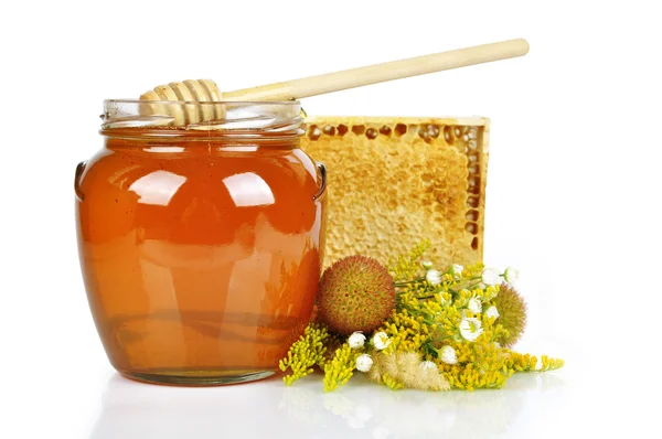 Сладкий мед в стеклянной банке — стоковое фото