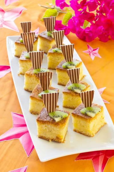 Square mini sponge cakes — Stock Photo, Image