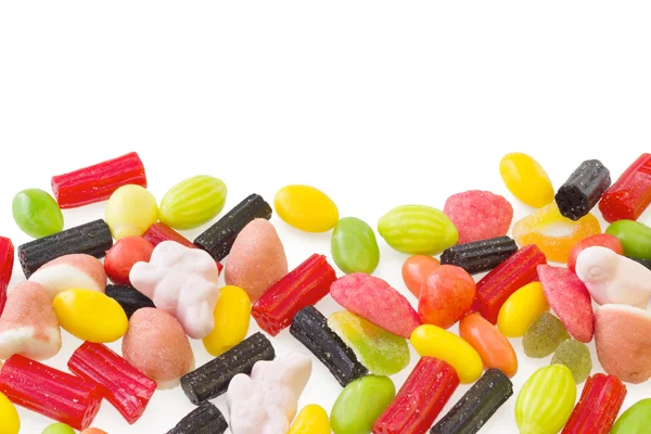 Bonbons colorés isolés sur fond blanc — Photo