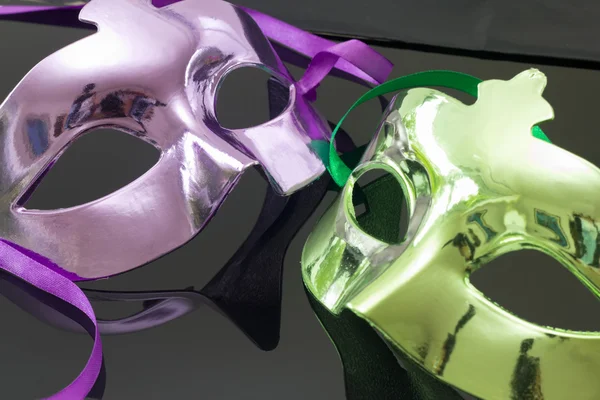 Purple and Green Mask on black background — Stock Photo, Image