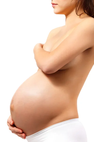 Femme enceinte touchant ici le ventre — Photo