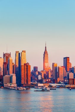 Manhattan at sunset clipart