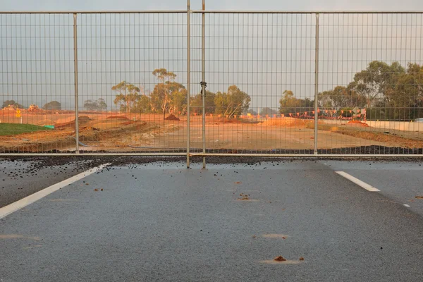 Gates on new road — Stock Photo, Image