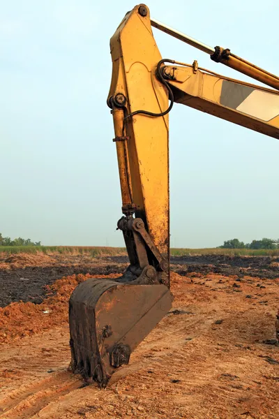Del av grävmaskin lastare med traktorgrävare — Stockfoto