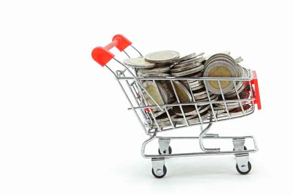 Isolated shopping cart with full wealth coins inside on white ba — Stock Photo, Image