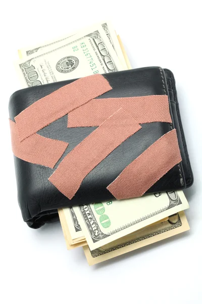 Uang di Dompet dengan Plaster Medis — Stok Foto