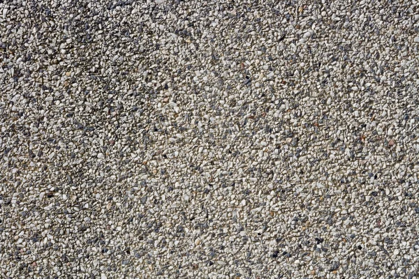 Пісок кам'яною стіною — стокове фото